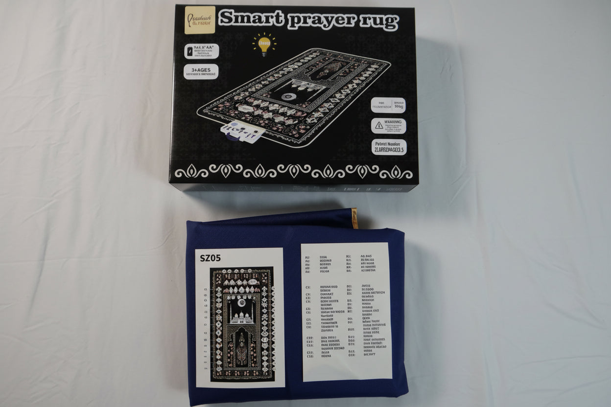 Box of a smart prayer rug on a white surface