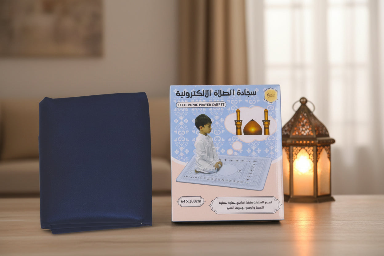 Navy prayer mat with electronic prayer carpet packaging and user manual on a white background